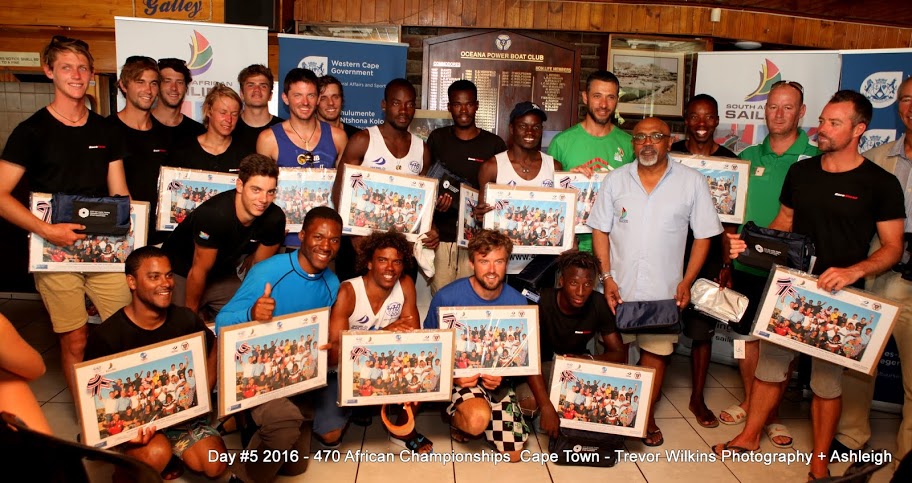 Teams are presented with a memento of the 470 African Championships